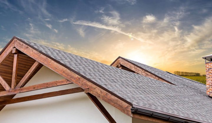 Exposed wood rafters under a new shingle roof